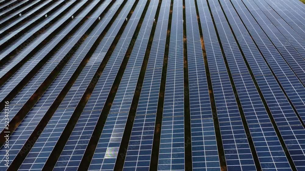 aerial of solar panel photovoltaic farm plant during a sunny day alternative electricity supply production aerial of solar panel photovoltaic farm plant during a sunny day alternative electricity supply production