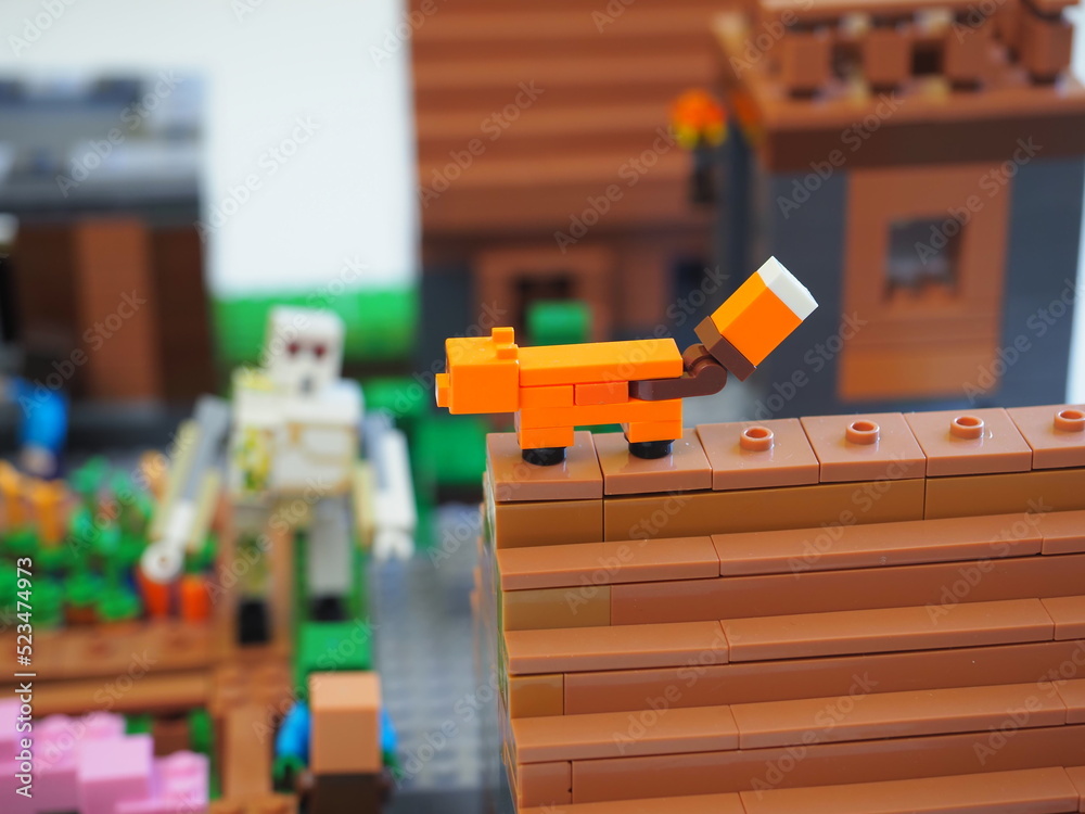 Naklejka premium Elements and fragments of Lego village world set. Characters of electronic game Minecraft. Children's designer with small details, developing motor skills and imagination.