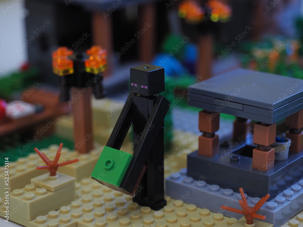 Naklejka premium Elements and fragments of Lego village world set. Characters of electronic game Minecraft. Children's designer with small details, developing motor skills and imagination.