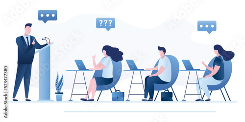 Male lecturer or speaker makes a speech. The students listen to the teacher. Lecture, business mentor speaks. People sit at workplaces. Business communication, presentation.