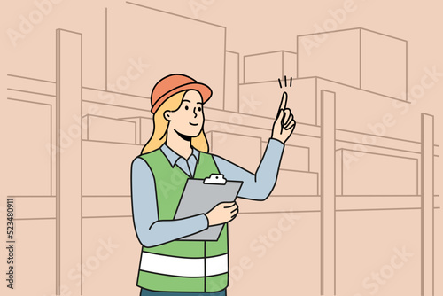 Woman engineer in uniform working at warehouse. Female employee in helmet busy at depot or storehouse. Vector illustration. 