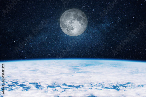 Fototapeta Naklejka Na Ścianę i Meble -  Beautiful space view of the amazing blue planet Earth with the moon. Moon with craters flies near planet Earth
