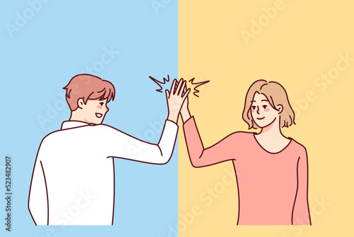 Happy man and woman give high five. Smiling people greeting outdoors. Body language and nonverbal communication. Vector illustration. 