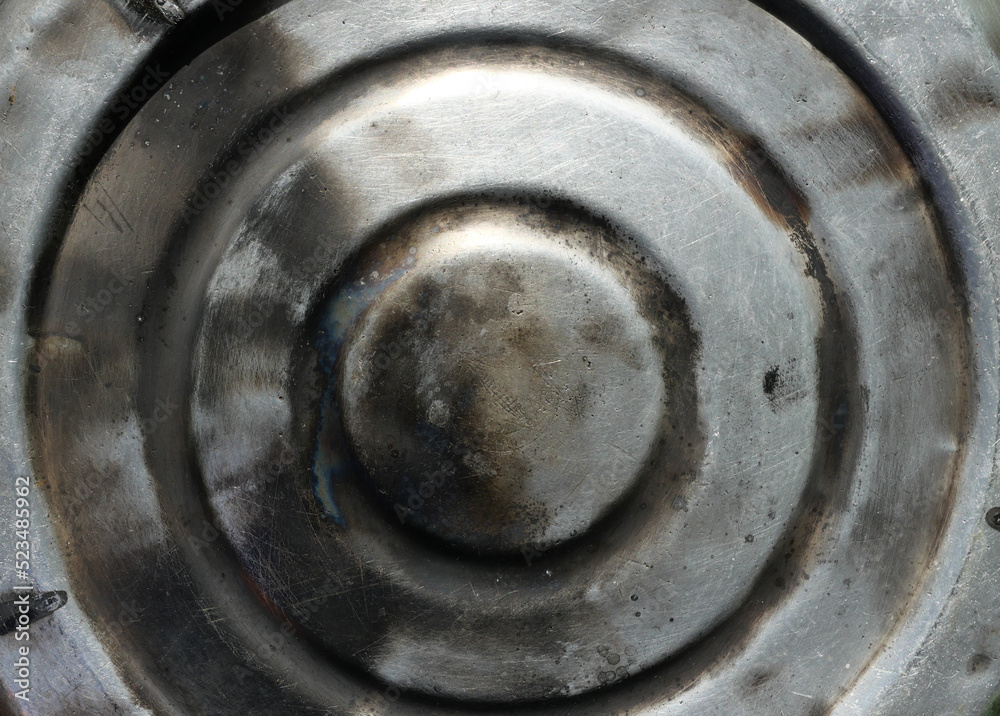Black circle line with Burn marks and scratch effect on dirty metal, Grunge black and white distress texture for add text or graphic design Brown stain on silver surface of Old steamer pot Black circle line with Burn marks and scratch effect on dirty metal, Grunge black and white distress texture for add text or graphic design Brown stain on silver surface of Old steamer pot