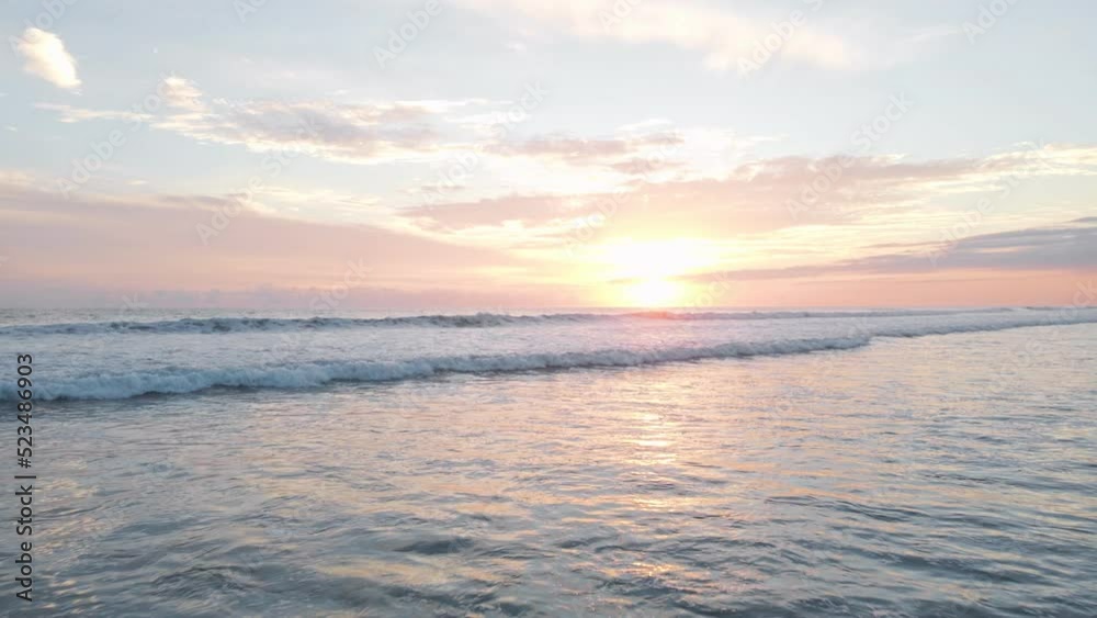 drone flight at sunset over the ocean surf at playa bandera beach in costa rica drone flight at sunset over the ocean surf at playa bandera beach in costa rica