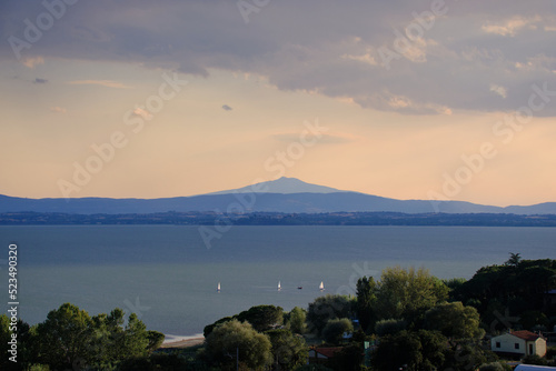 Panoramic view of lake Trasimeno from Passignano at sunset, Italy © Paolo