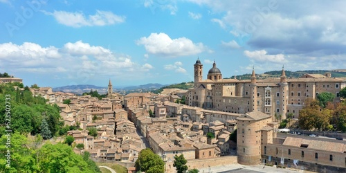 Aerial view of Urbino with the Ducal Palace of Urbino built by Federico da Montefeltro in the center. Urbino, Pesaro and Urbino, Italy  © DVisions
