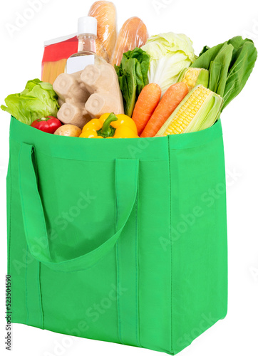 Green reusable shopping bag full of groceries, no background PNG file photo