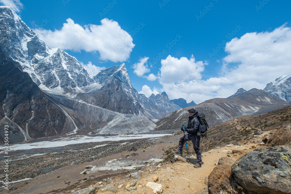 Fototapeta premium view from Kala Patthar of himalayas mountains with beautiful clouds on sky and Khumbu Glacier, way to Mt Everest base camp, Khumbu valley, Sagarmatha national park, Nepal.
