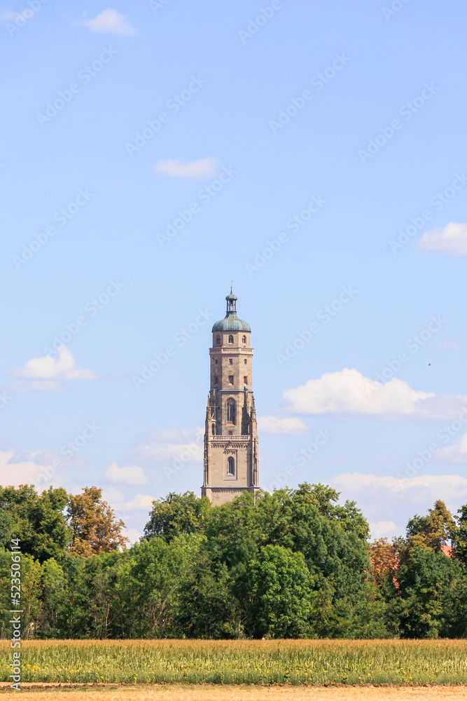 the steeple of the Evangelical Lutheran parish church in the center of the city of Noerdlingen is the landmark of the city and is popularly called Daniel