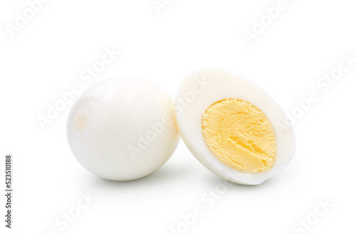 Hard boiled egg whole and half isolated on white background 