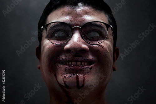 Serial killer maniac on dark background