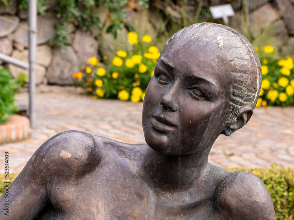 close-up of bronze sculpture of the nymph at the Trauttmansdorff gardens of Merano - South Tyrol, northern Italy