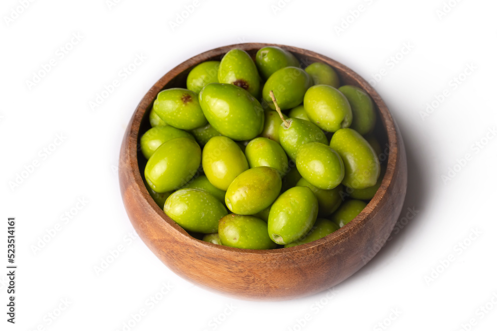 Fresh green olives on the white background Fresh green olives on the white background