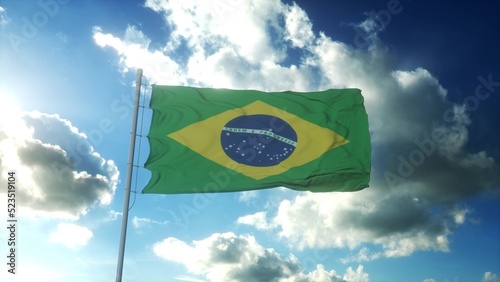Flag of Brazil waving at wind against beautiful blue sky. 3d illustration