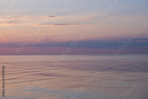Blurred background sea and sky at sunrise.