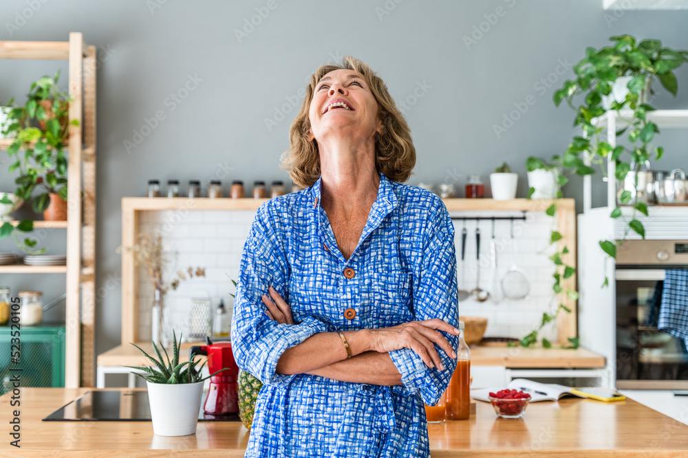 Beautiful mature senior woman at home - Cheerful active mature female person in her apartment, concept about domestic life, healthy lifestyle and quality of life Beautiful mature senior woman at home - Cheerful active mature female person in her apartment, concept about domestic life, healthy lifestyle and quality of life
