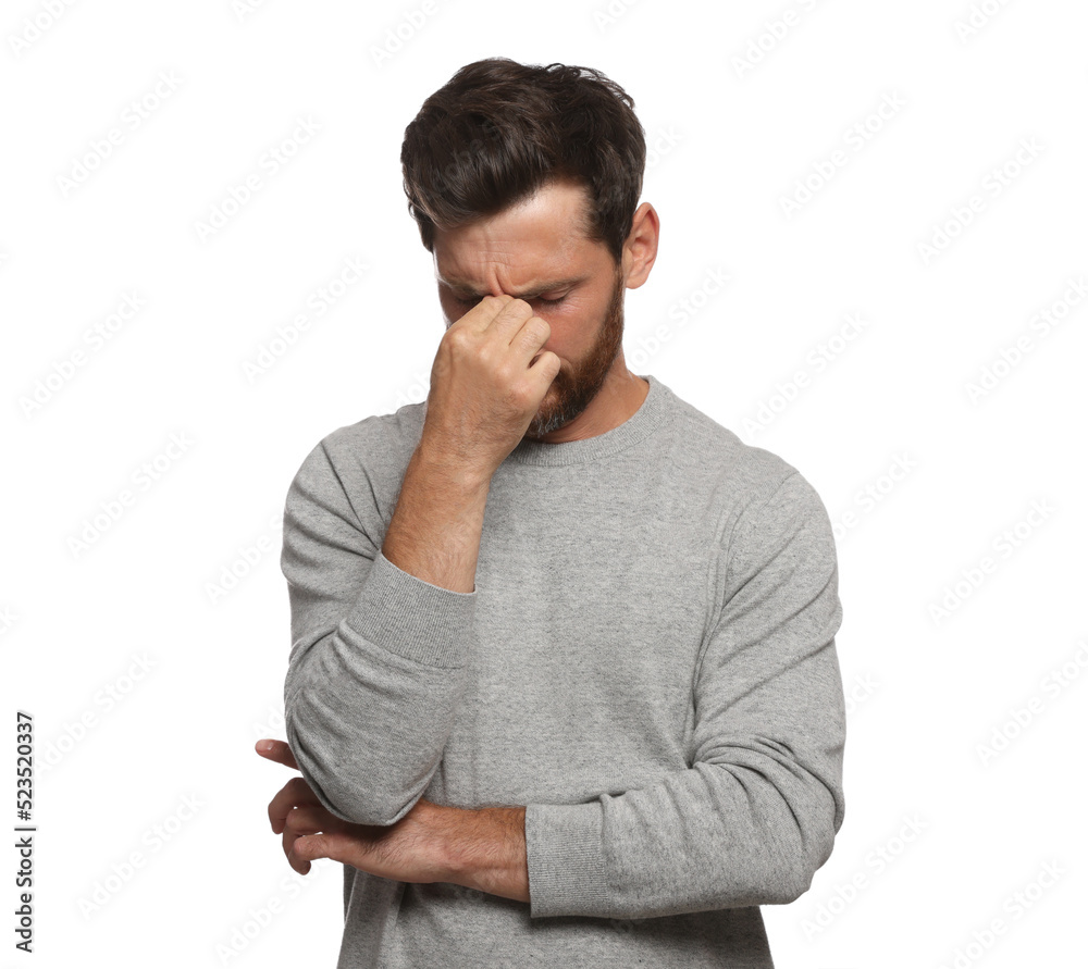 Man suffering from eyestrain on white background Man suffering from eyestrain on white background