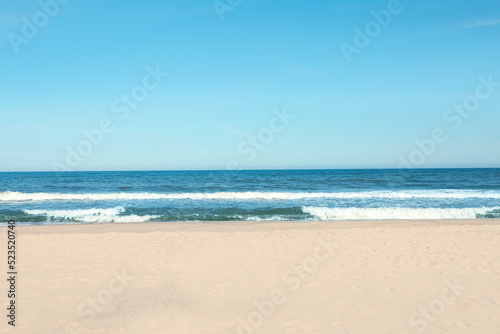 Picturesque view of beautiful sea and sandy beach on sunny day