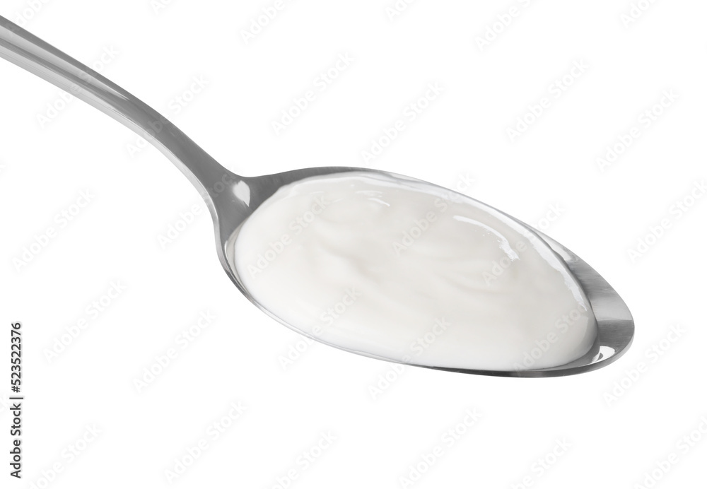 Spoon with delicious organic yogurt isolated on white Spoon with delicious organic yogurt isolated on white