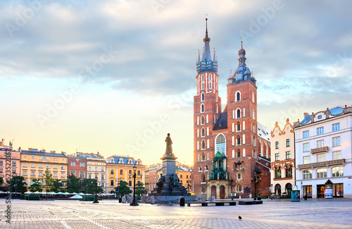 Mariacki Cathedral at Market square in Krakow at the center of old town at sunrise, Poland