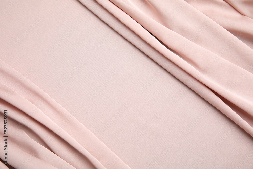 Obraz premium Texture of delicate pink silk as background, top view