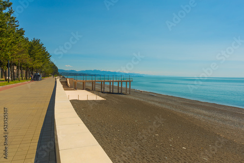 KOBULETI, GEORGIA: Landscape with a view of the promenade by the beach on the Black Sea on a sunny summer day.
