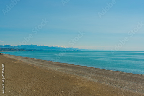 KOBULETI, GEORGIA: Landscape with a view of the promenade by the beach on the Black Sea on a sunny summer day.