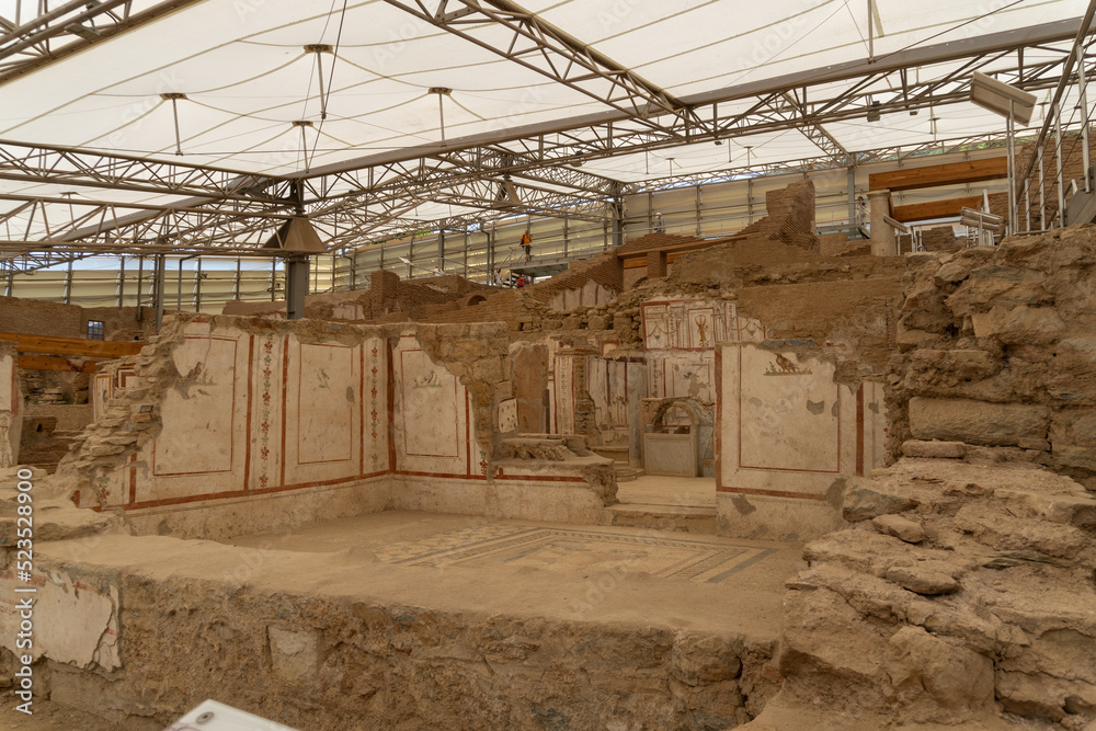 Interior of the excavations at Ephesus, with the ruined ancient houses and exposed mosaics. Interior of the excavations at Ephesus, with the ruined ancient houses and exposed mosaics.