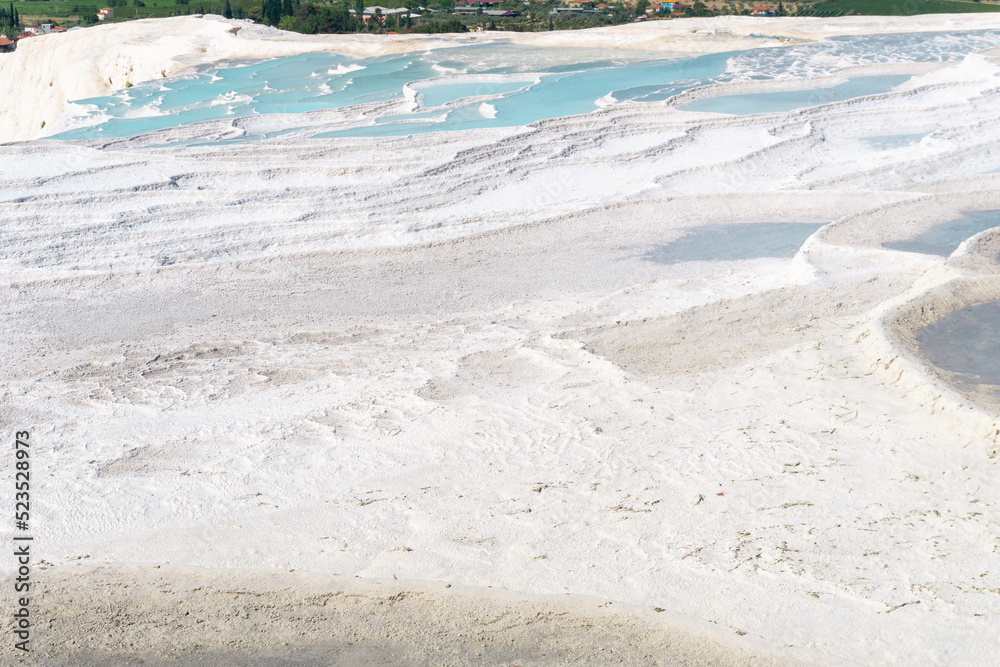 Pamukkale pools in its dry season, with some pools with turquoise water