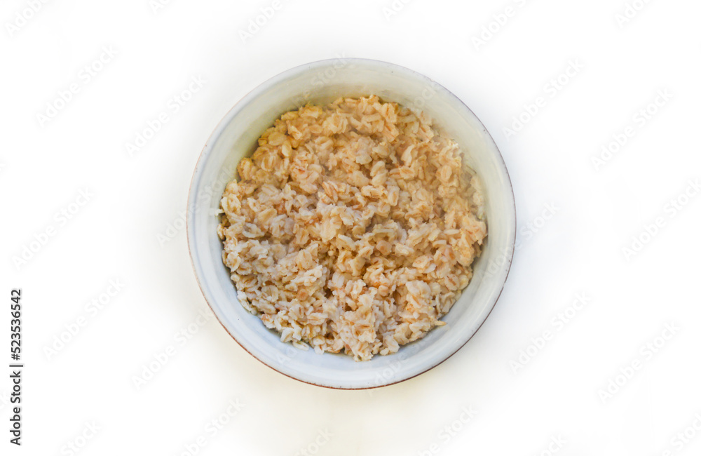 A bowl with oatmeal with the selective focus. Good for any project. A bowl with oatmeal with the selective focus. Good for any project.