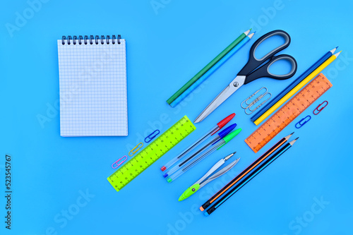 The concept of Back to School. September 1st. School supplies, accessories for the classroom - pencils, notebooks, scissors, paper clips. Space for copying. Business records.