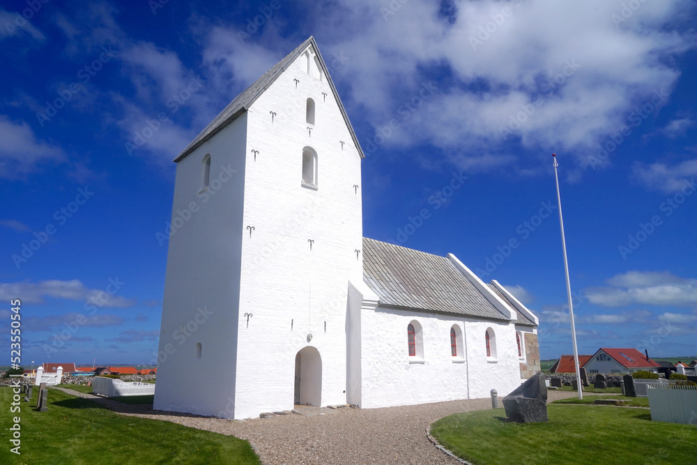Ferring Kirke, beautiful white church in front of the blue sky at Denmarks North Sea coast near Lemvig, Jutland, marriage, wedding Ferring Kirke, beautiful white church in front of the blue sky at Denmarks North Sea coast near Lemvig, Jutland, marriage, wedding