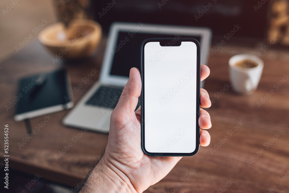 Smartphone mockup, internet of things and smart home concept, man using mobile phone Smartphone mockup, internet of things and smart home concept, man using mobile phone