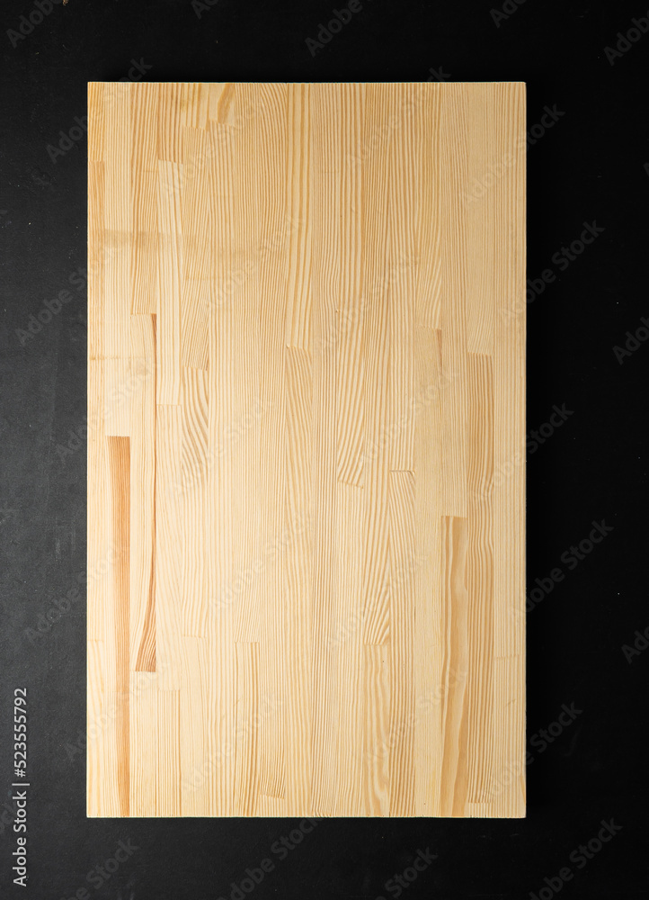 Naklejka premium old wooden board as background