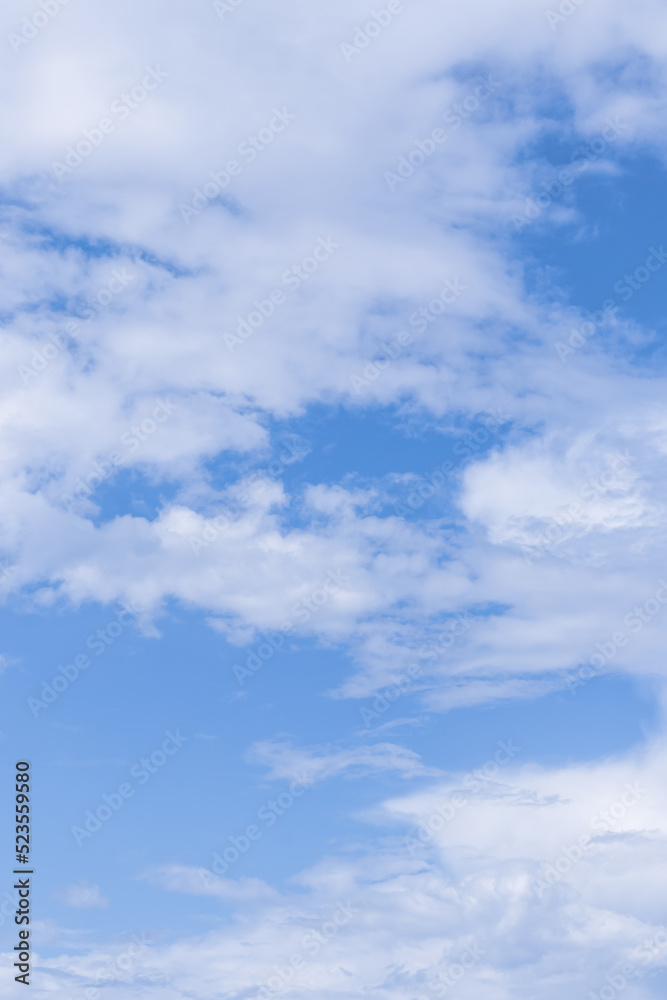 Clear blue sky and beautiful white clouds. Cumulus cloud, nature background. Cloudscape. Abstract wallpaper, heaven pattern. Summer season. Warm weather.