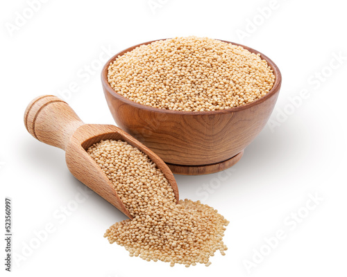 Tablou pe pânză Wooden bowl and scoop full of amaranth seeds isolated on white