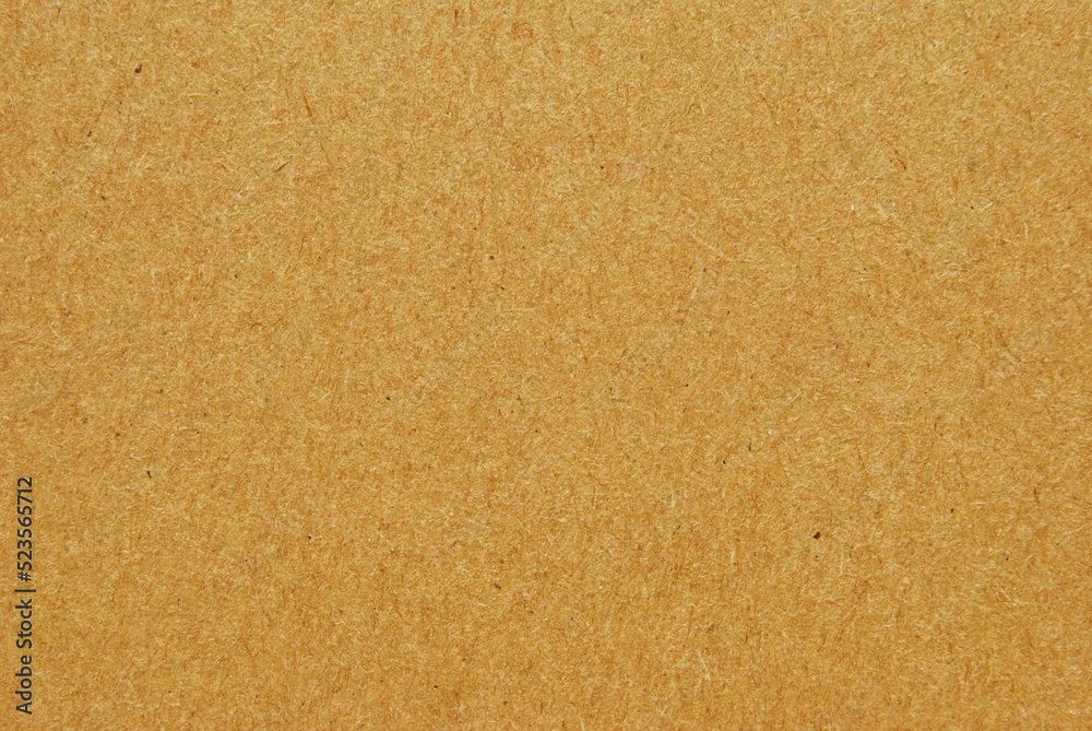 A sheet of brown recycled cardboard texture as background