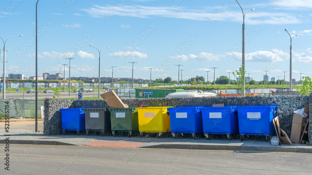 Garbage containers for garbage segregation on the street. Colored
