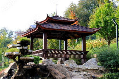 beautiful landscape park, lake, wooden pavilions in Japanese style. Garden architecture, Uman, Ukraine photo