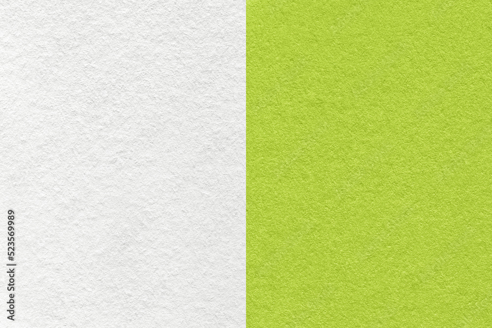 Fototapeta premium Texture of craft white and gray paper background, half two colors, macro. Structure of vintage dense olive cardboard.