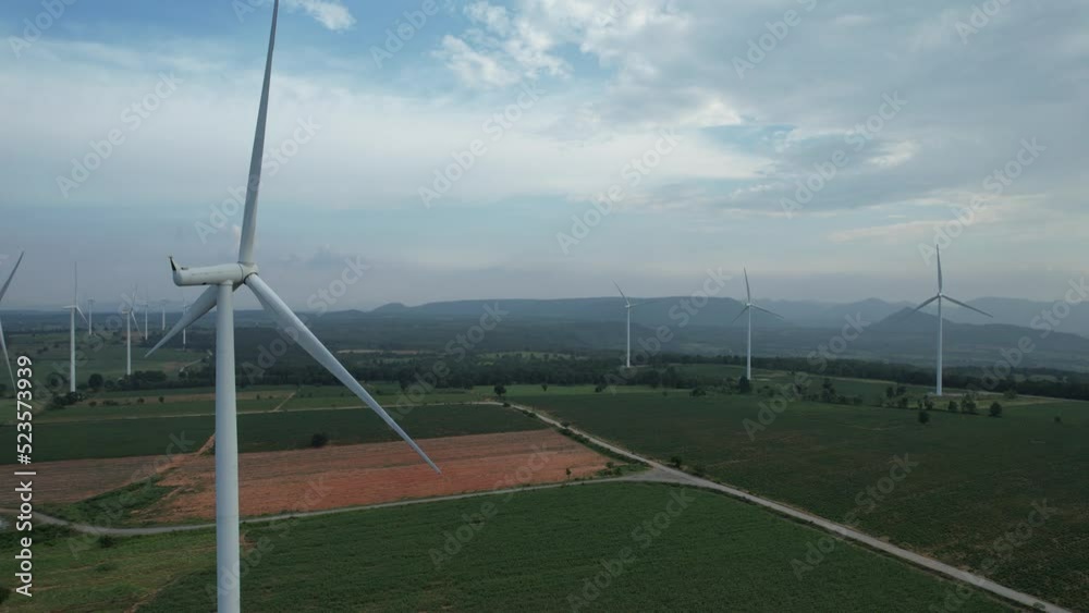 Drone view of farm wind turbine on the mountain,Use wind power to generate electricity,wind energy is mostly the use of wind turbines to generate electricity Drone view of farm wind turbine on the mountain,Use wind power to generate electricity,wind energy is mostly the use of wind turbines to generate electricity