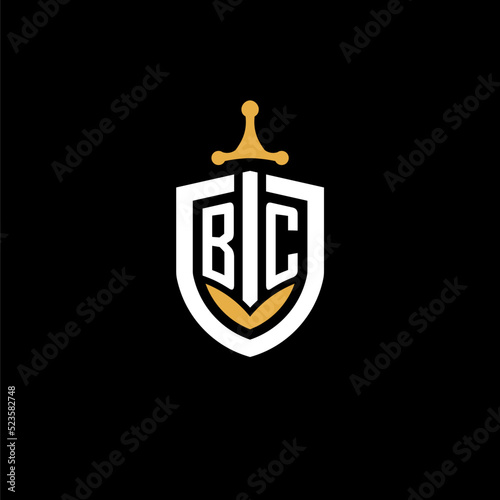 Creative letter BC logo gaming esport with shield and sword design ideas