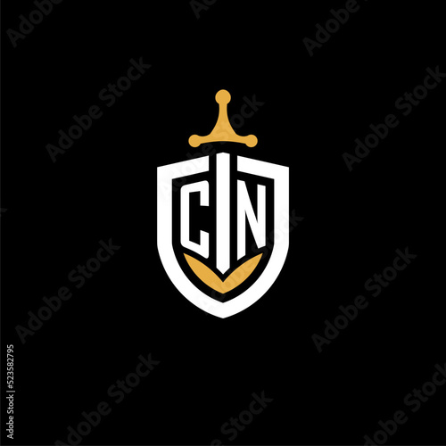Creative letter CN logo gaming esport with shield and sword design ideas