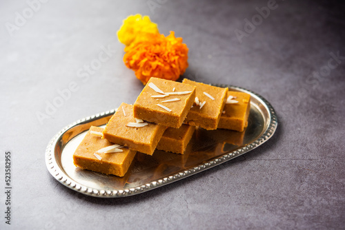 Besan burfi or Mohanthal roasted barfi - an indian sweet photo