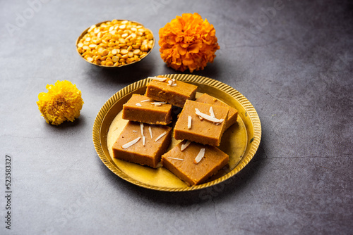 Besan burfi or Mohanthal roasted barfi - an indian sweet photo