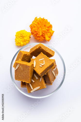 Besan burfi or Mohanthal roasted barfi - an indian sweet photo