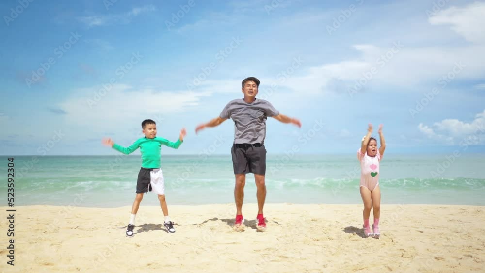 4K Happy Asian family on summer vacation. Grandfather jogging exercise with little grandchild boy and girl on the beach in sunny day. Senior man and children kid enjoy outdoor activity at the beach 4K Happy Asian family on summer vacation. Grandfather jogging exercise with little grandchild boy and girl on the beach in sunny day. Senior man and children kid enjoy outdoor activity at the beach