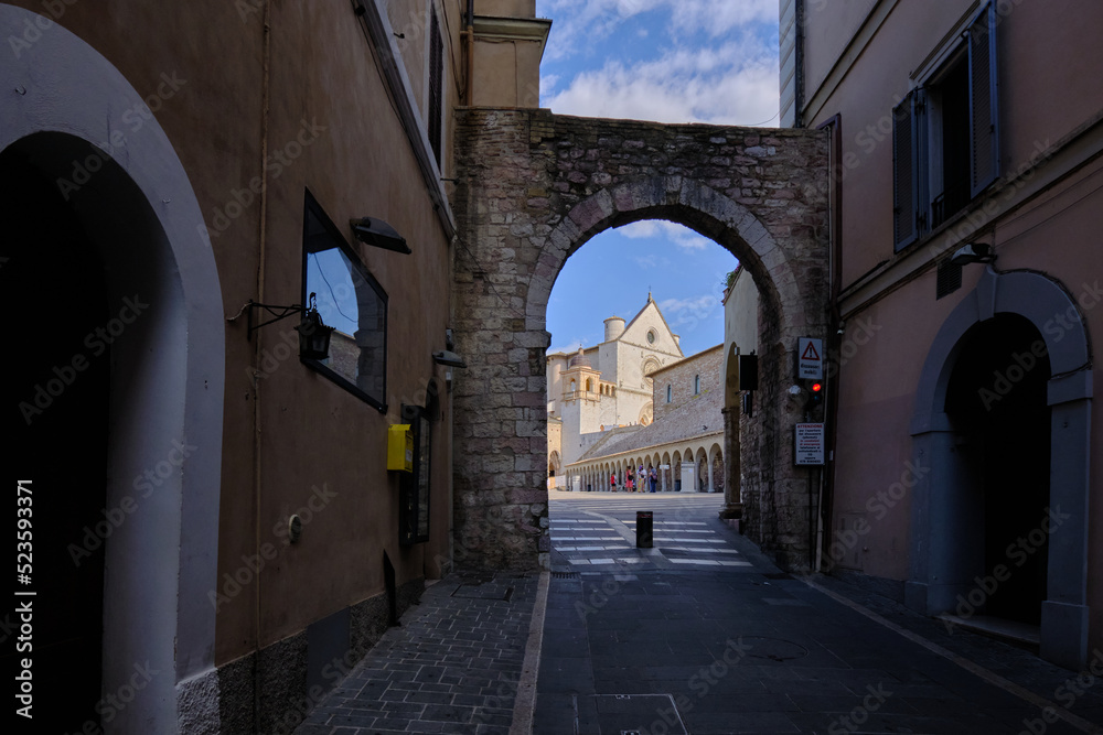 Gate to the complex of theBasilica of Saint Francis of Assisi (basilica di San Francesco in Assisi) in the ancient town of Assisi, Umbria, Italy
