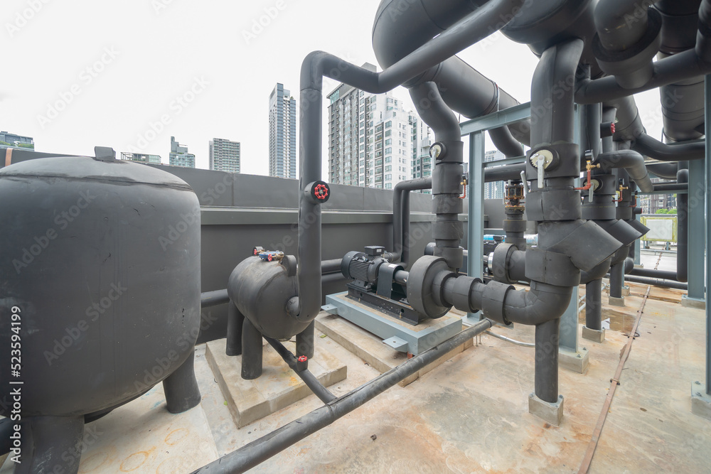 Chiller tower or cooling tower on rooftop of a office building in urban